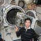 Japanese astronaut Kimiya Yui preparing the exposure experiment module.